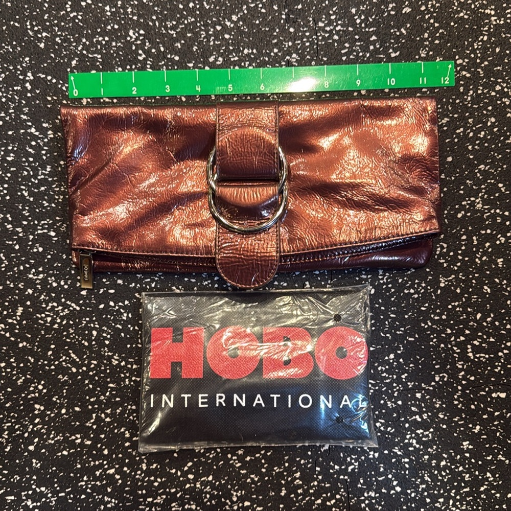 NWOT Hobo International Bronze Metallic Clutch Gingham interior silver rings